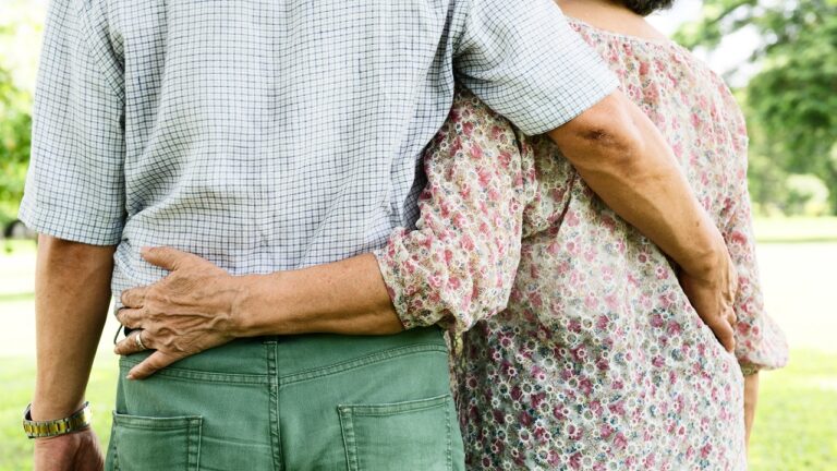 Older couple supporting each other